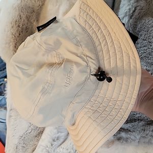 columbia tan nylon UPF bucket hat with adjustable drawstring osfa